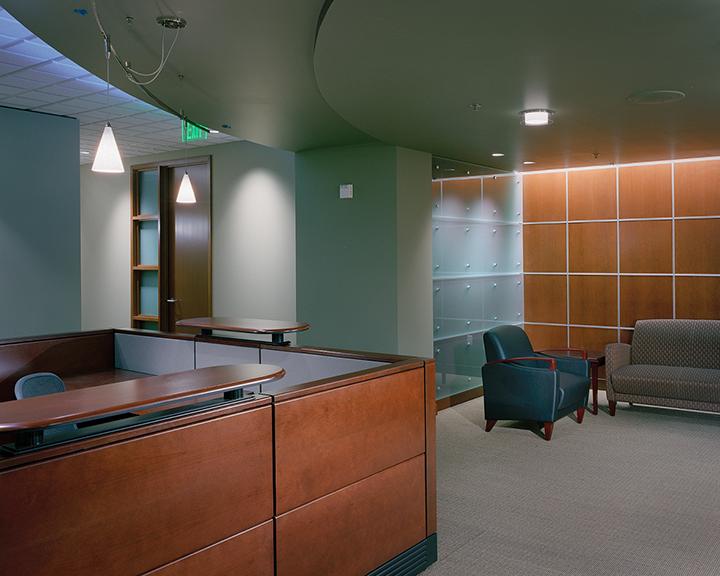 Custom commercial reception desk by V and O